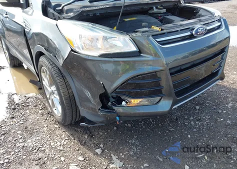 2016 Ford Escape Titanium z USA, uszkodzony, nr VIN 1FMCU9JX1GUC33014